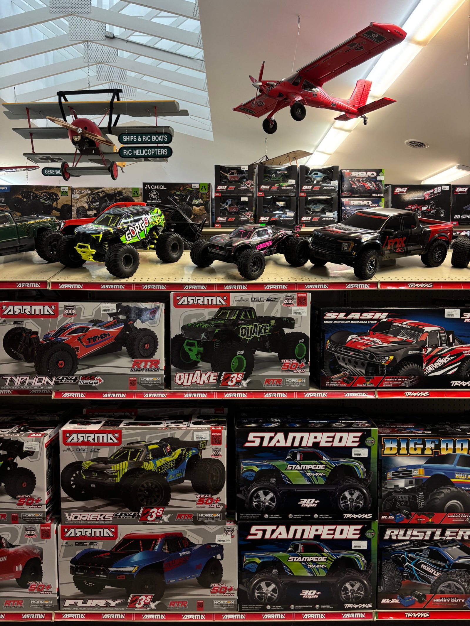 Interior of Ray & Robin’s Hobby Center in Maine featuring RC cars and model airplanes